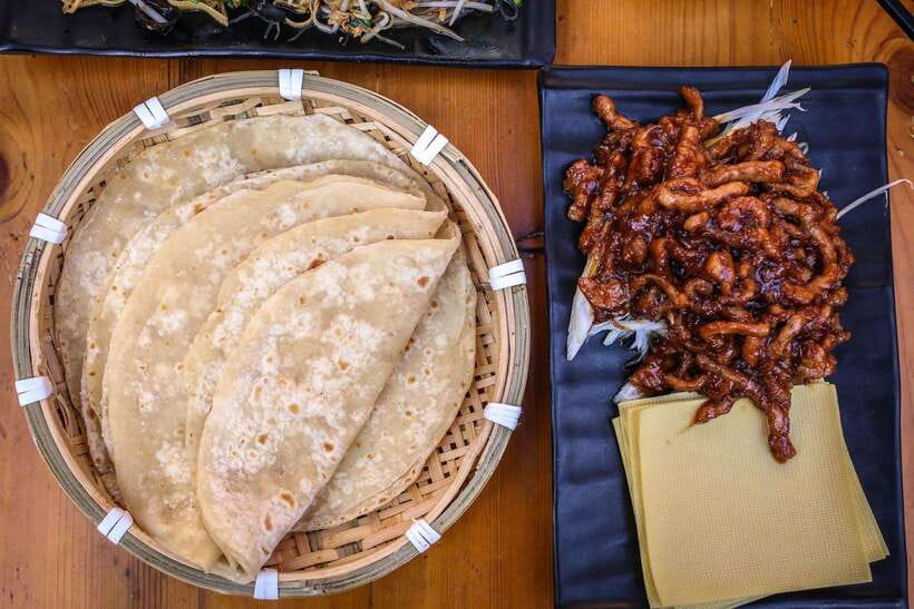 Beijing: Hidden Gems Guided Food Tour with Beer and Tastings - Stop 3: The Muslim Specialty Linked to Empress Cixi (Baijiu Included)