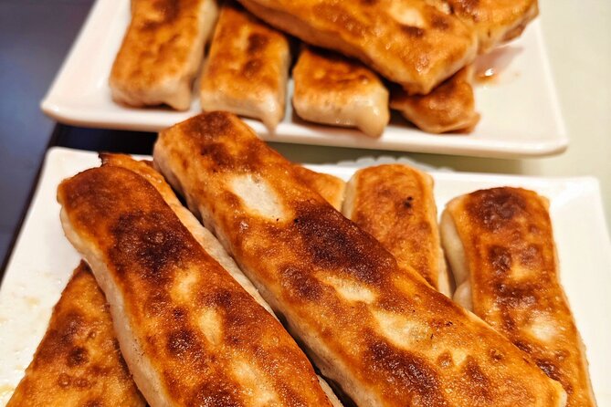 Beijing Walking Food Tour with a Local Friend - The food lineup: from zhajiang mian to the surprise bite
